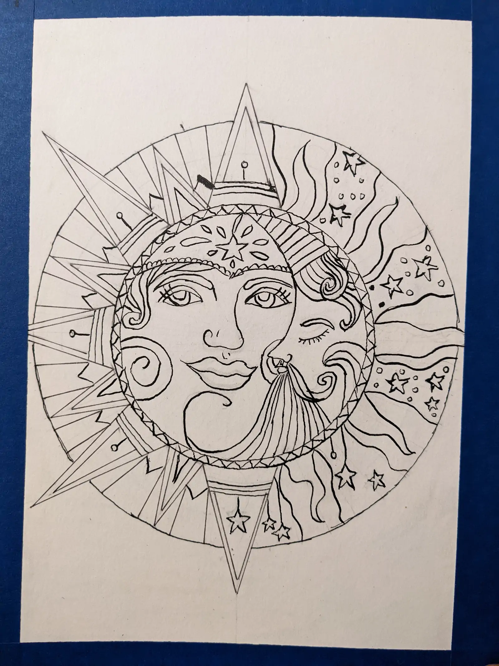 Sun and moon in yin-and-yang-style drawing. Inked.