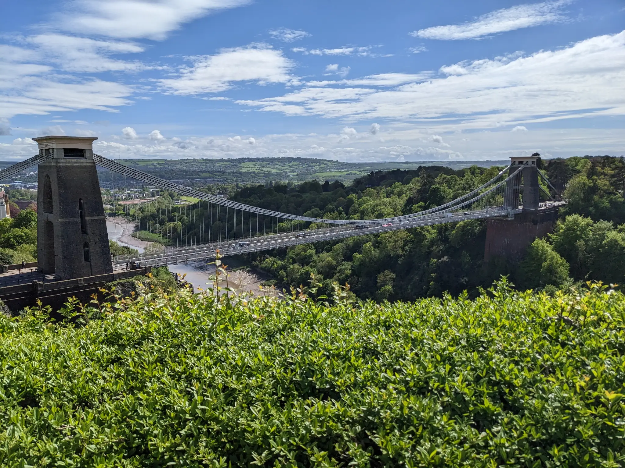 The Clifton Suspension Bridge, as seen from uphill, overlooking the bridge and river.