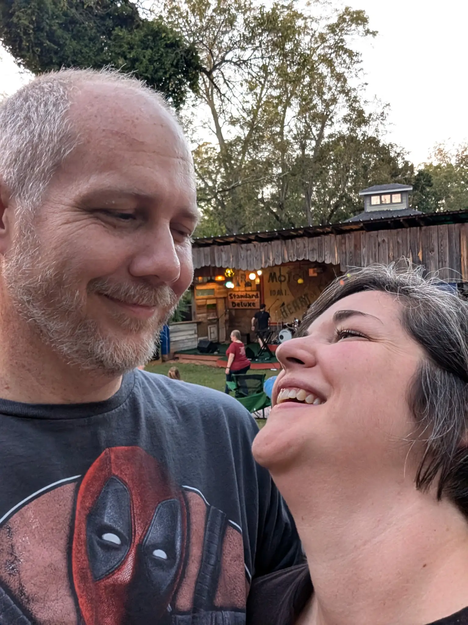 Ashley and Justin at the Shinyribs concert in an outdoor venue.